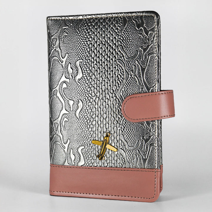 Travel Wallet with embossed design and pink leather accents on a white background by TPC Gifts