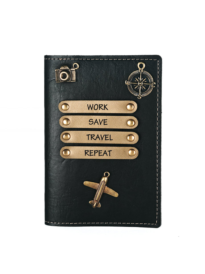 Black leather passport cover with gold accents and motivational phrases on a white background