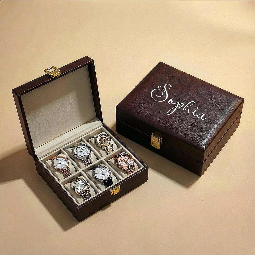 Set of watches in a brown display case with &