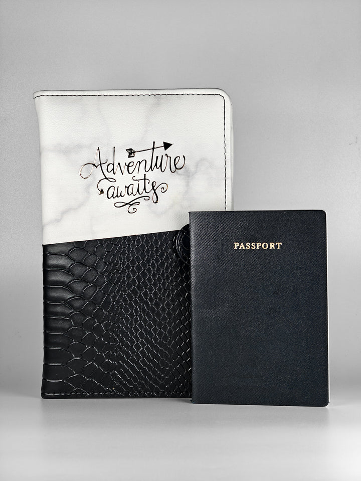Travel organizer with personalized name tag and embossed ‘Adventure Awaits’ design – a trendy passport cover and passport holder for all travel essentials.