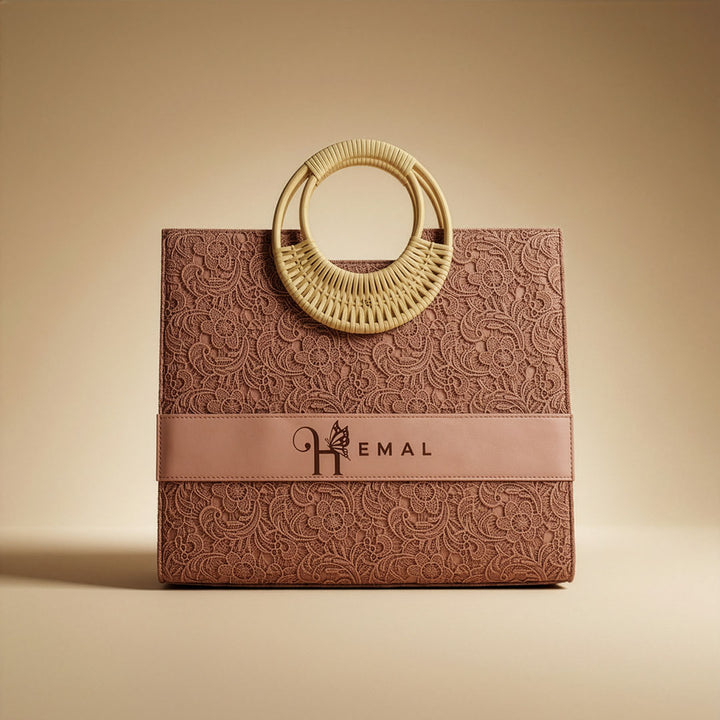 personalized tote bag in brown colour with name hemal on a  beige background by TPC Gifts