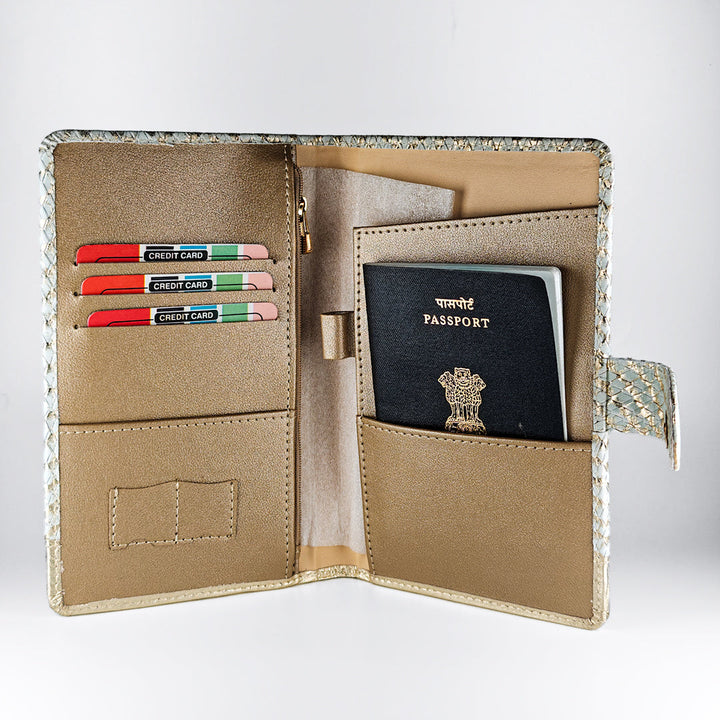Beige travel wallet with passport and cards on a white background