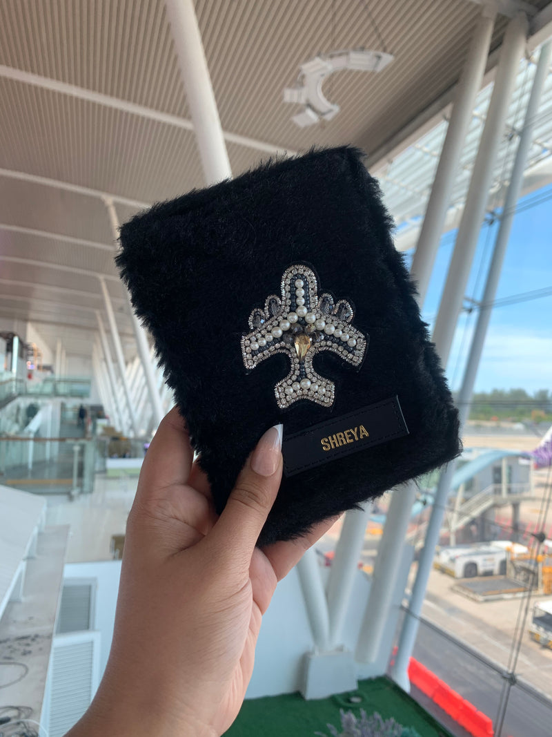 Passport Cover Black Fur with Diamond Plane in an airport