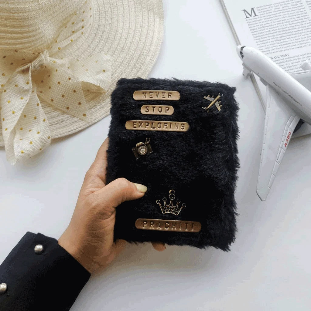 Personalised Black Fur Passport Cover by TPC Gifts. Comes with various charms and quotes. 