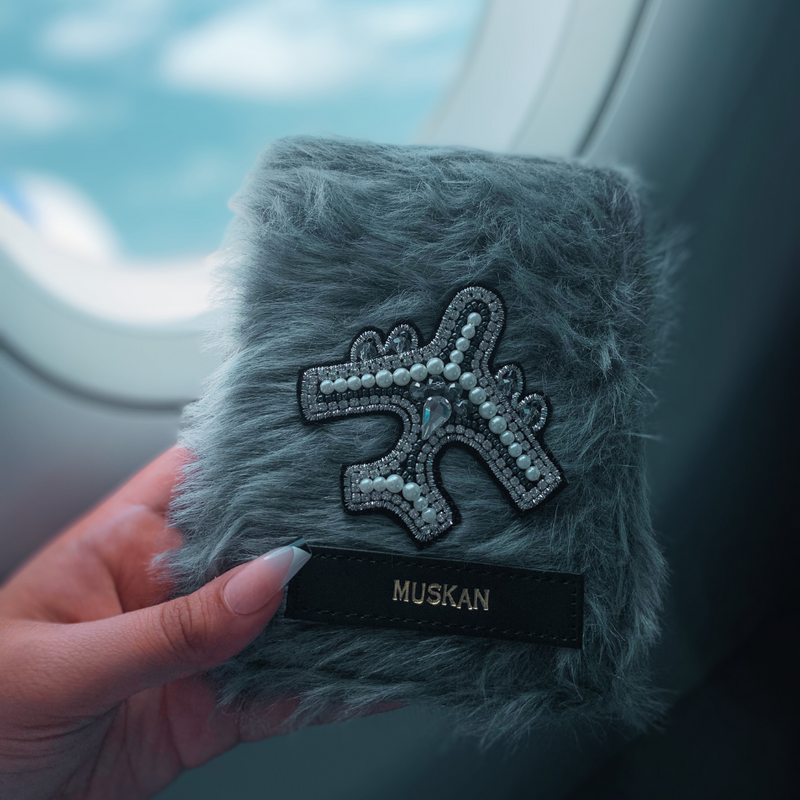 Grey Fur Passport Cover by TPC Gifts inthe plane