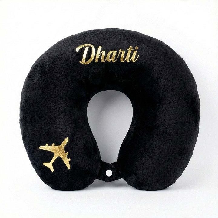 Black travel neck pillow with gold airplane and &