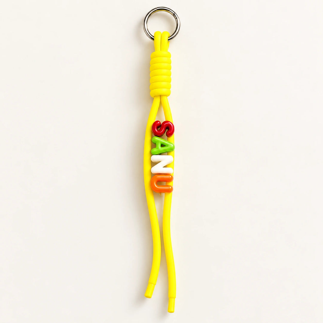 Yellow Colour Pop personalised rope keychain with colourful alphabet name beads and a metal ring