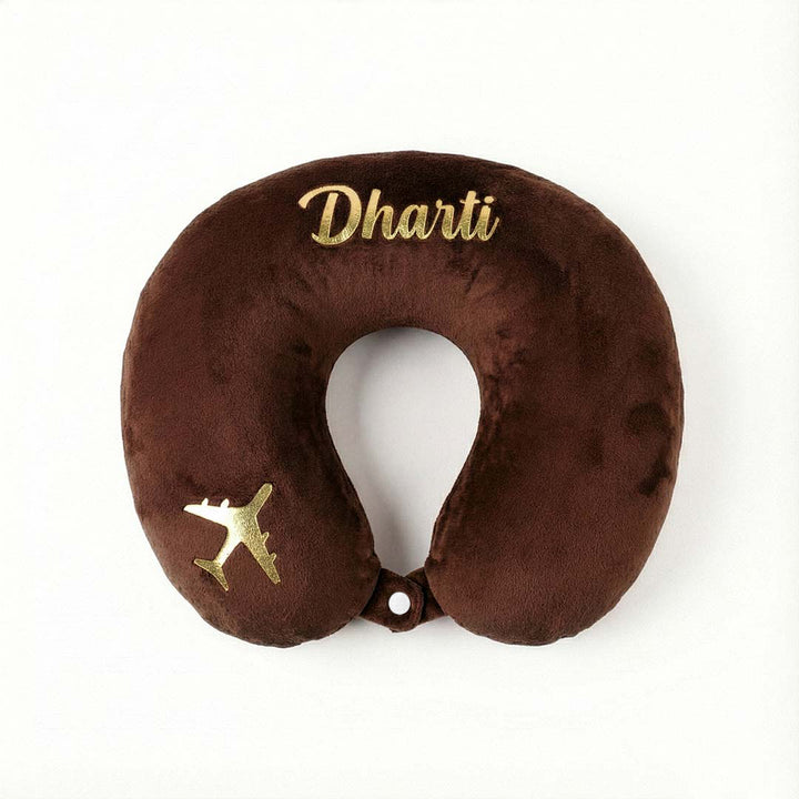 Brown travel neck pillow with &