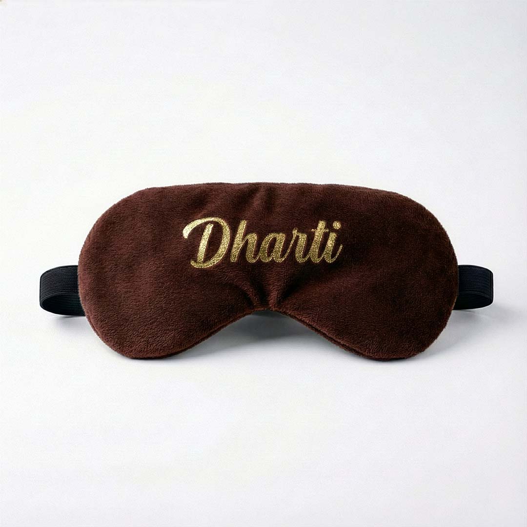 Brown travel sleep mask with &