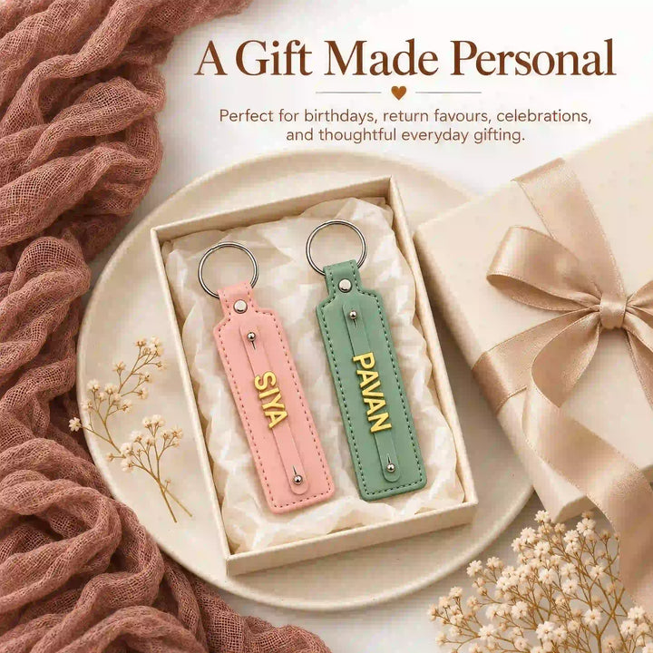Pink and mint personalised keychains shown in a gift presentation