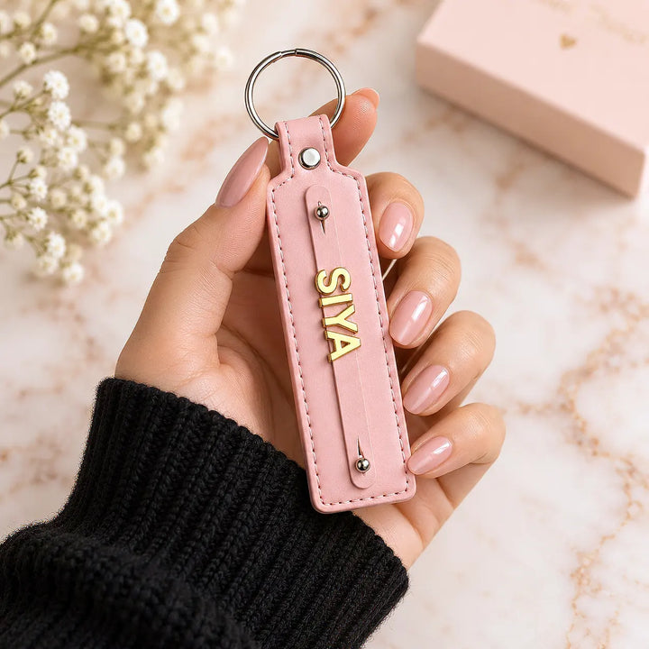 Blush Pink vegan-leather keychain with gold-tone name letters