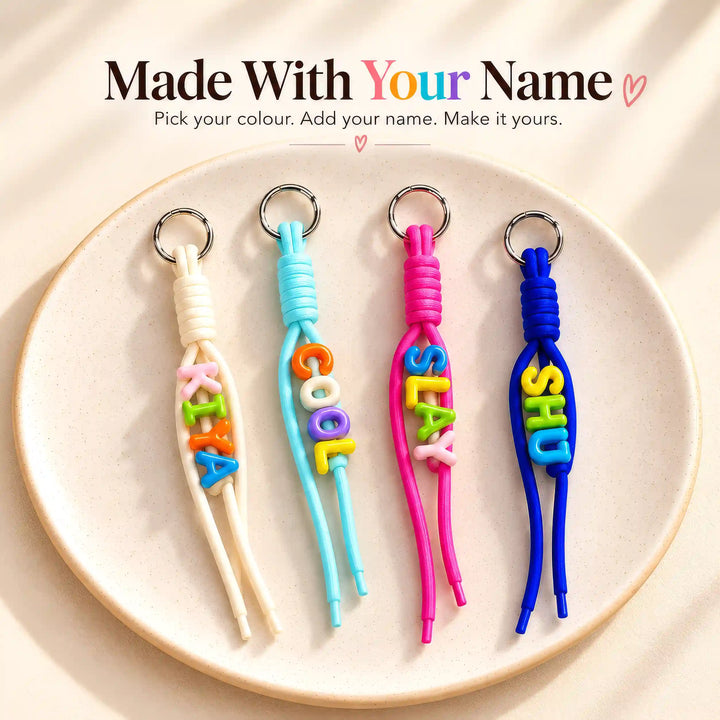Personalised rope keychains with names and words in Cream, Aqua, Hot Pink and Blue