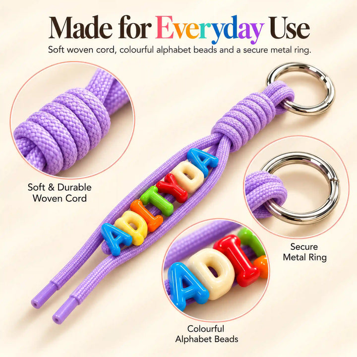 Woven cord, colourful alphabet beads and metal ring details on the personalised keychain