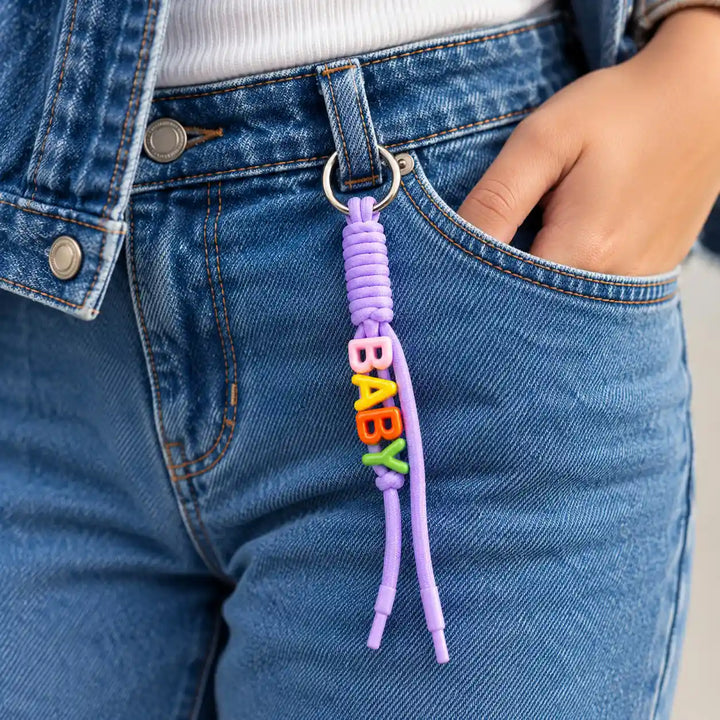 Lavender personalised rope keychain attached to a belt loop