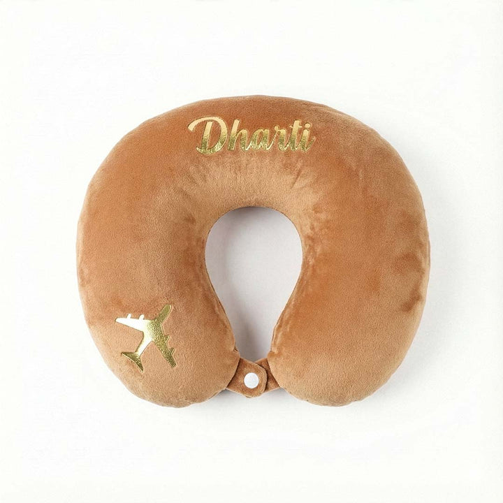 Brown neck pillow with &