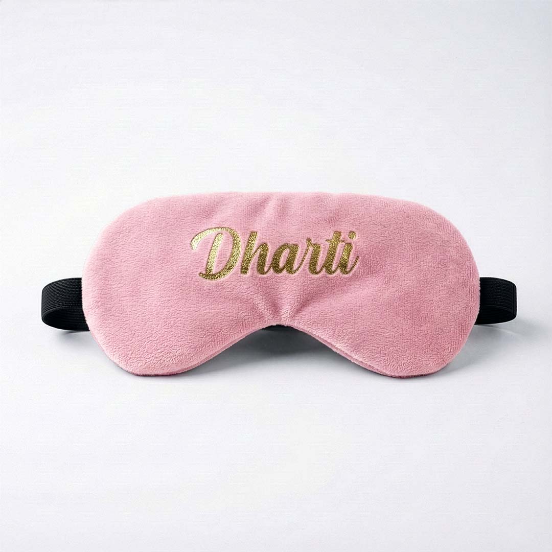 Pink travel sleep mask with &