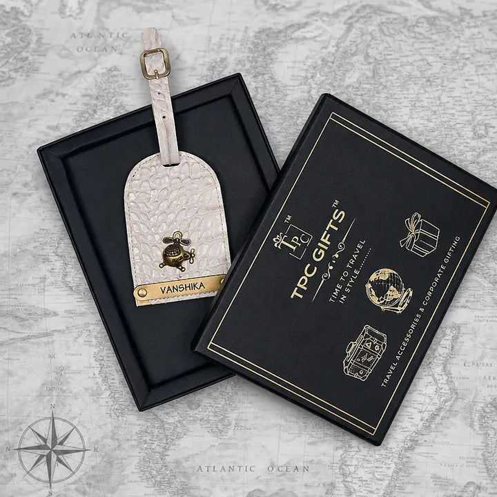 Luggage tag with brand logo on a gray world map background
