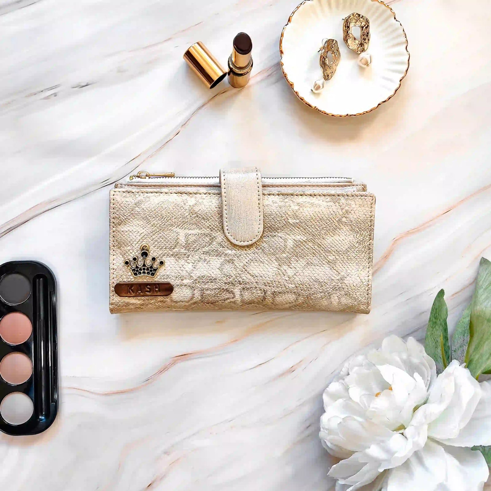 moonshine wallet with accessories on a marble surface