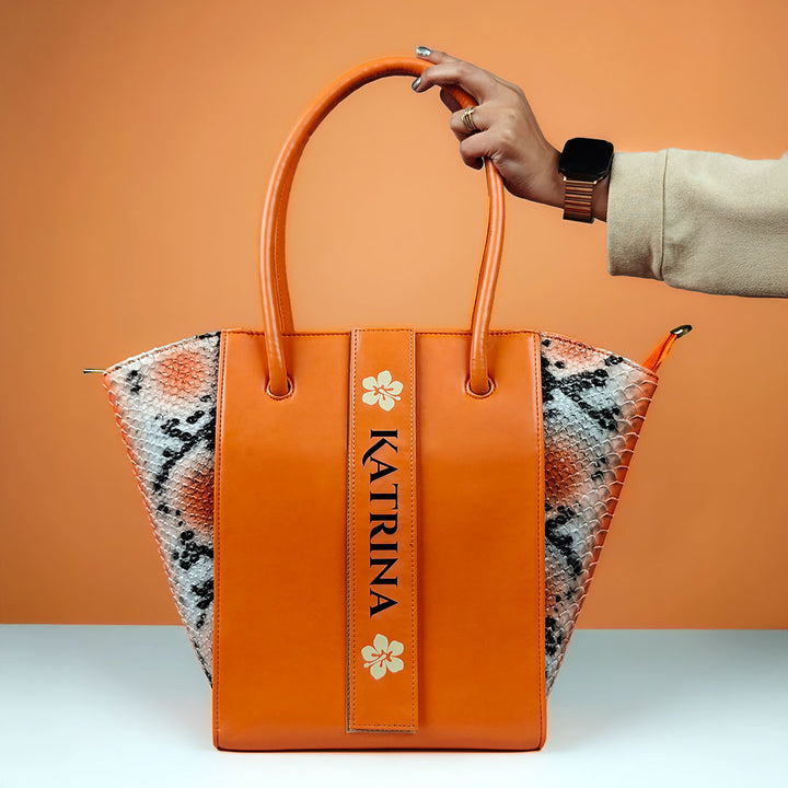 Orange handbag with &