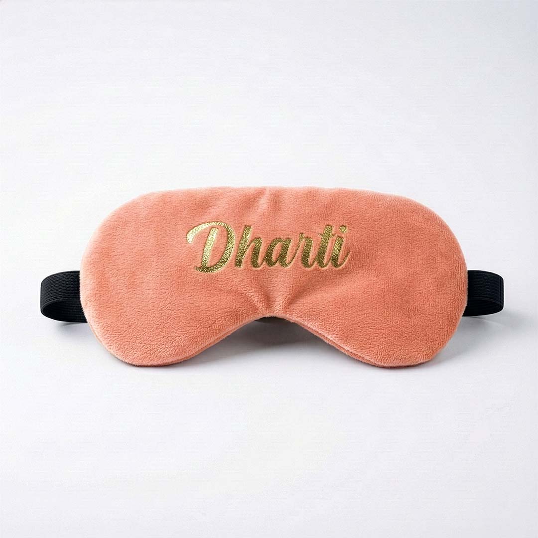 Pink travel sleep mask with &