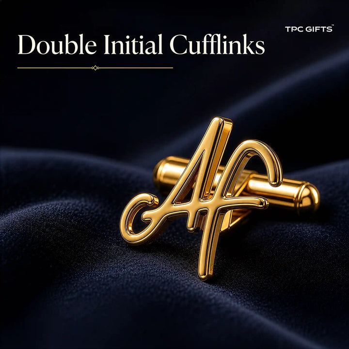 A pair of gold double initial cufflinks spelling &