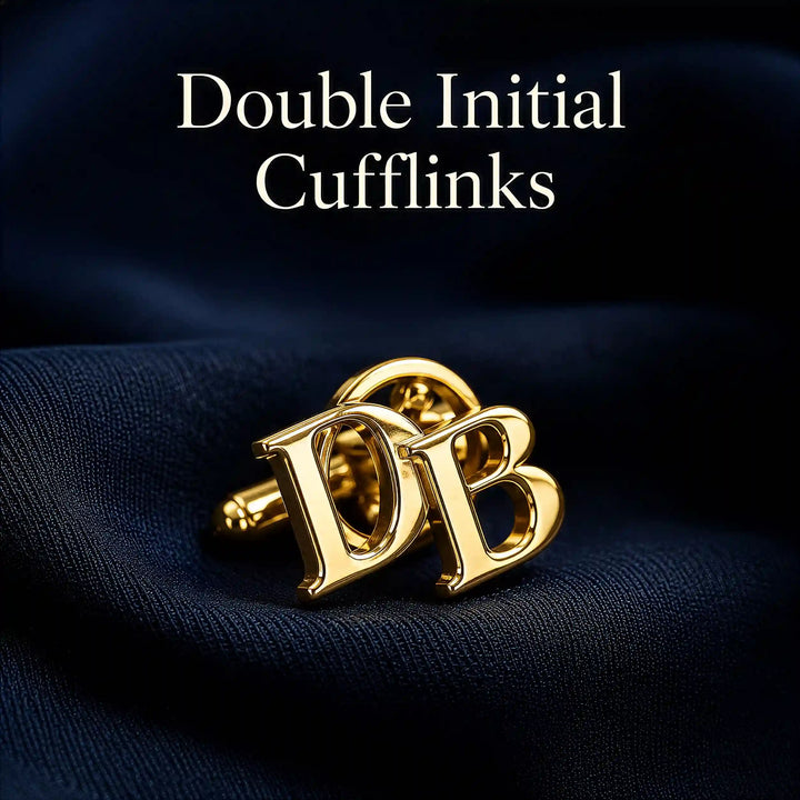 A pair of gold cufflinks featuring interlocking double initial letters &
