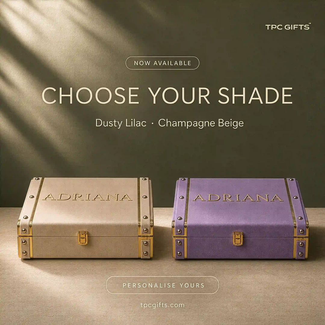 Personalised velvet trunk gift boxes by TPC Gifts in champagne beige and dusty lilac, names in raised gold lettering