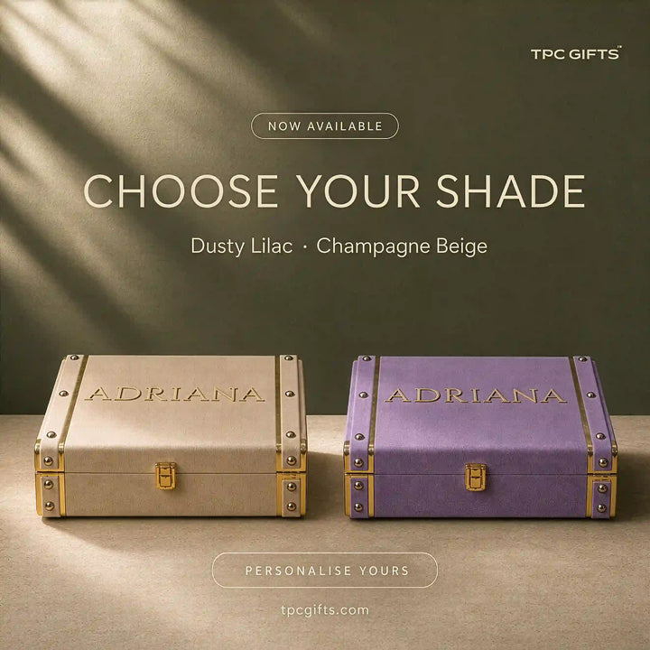 Personalised velvet trunk gift boxes by TPC Gifts in champagne beige and dusty lilac, names in raised gold lettering