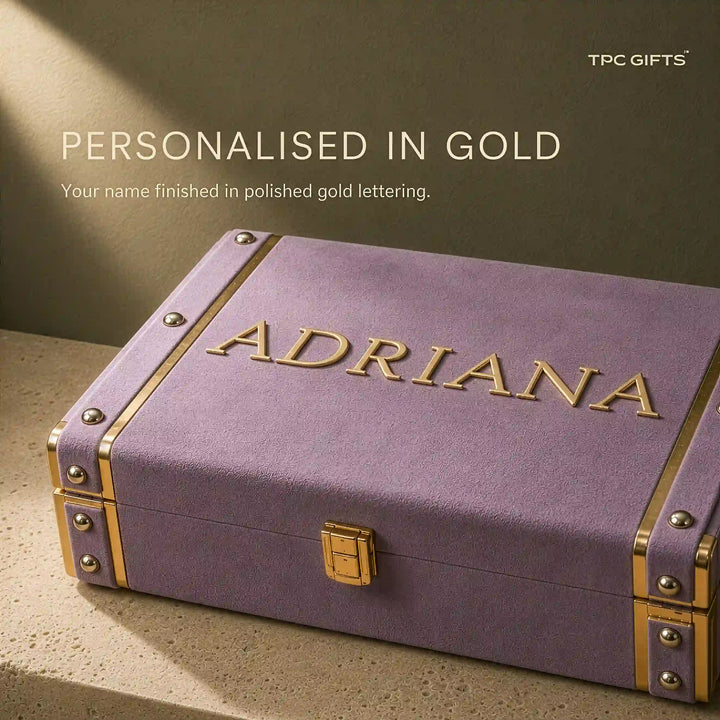 Name personalised in raised gold lettering on a dusty lilac velvet trunk gift box by TPC Gifts
