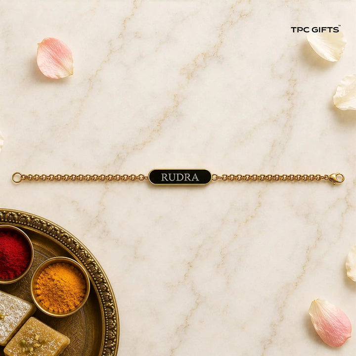Personalised Rakhi for Brother – Slim Gold Chain Bracelet with Black Engraved Name Plate