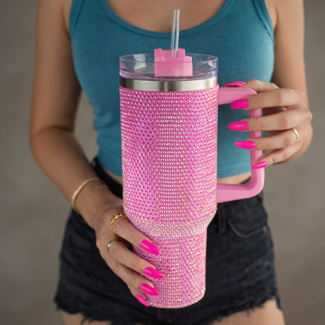 Pink rhinestone bling tumbler with handle and straw by TPC Gifts, stylish insulated sipper for everyday use.