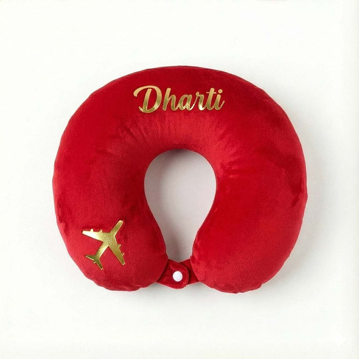 Red travel neck pillow with &