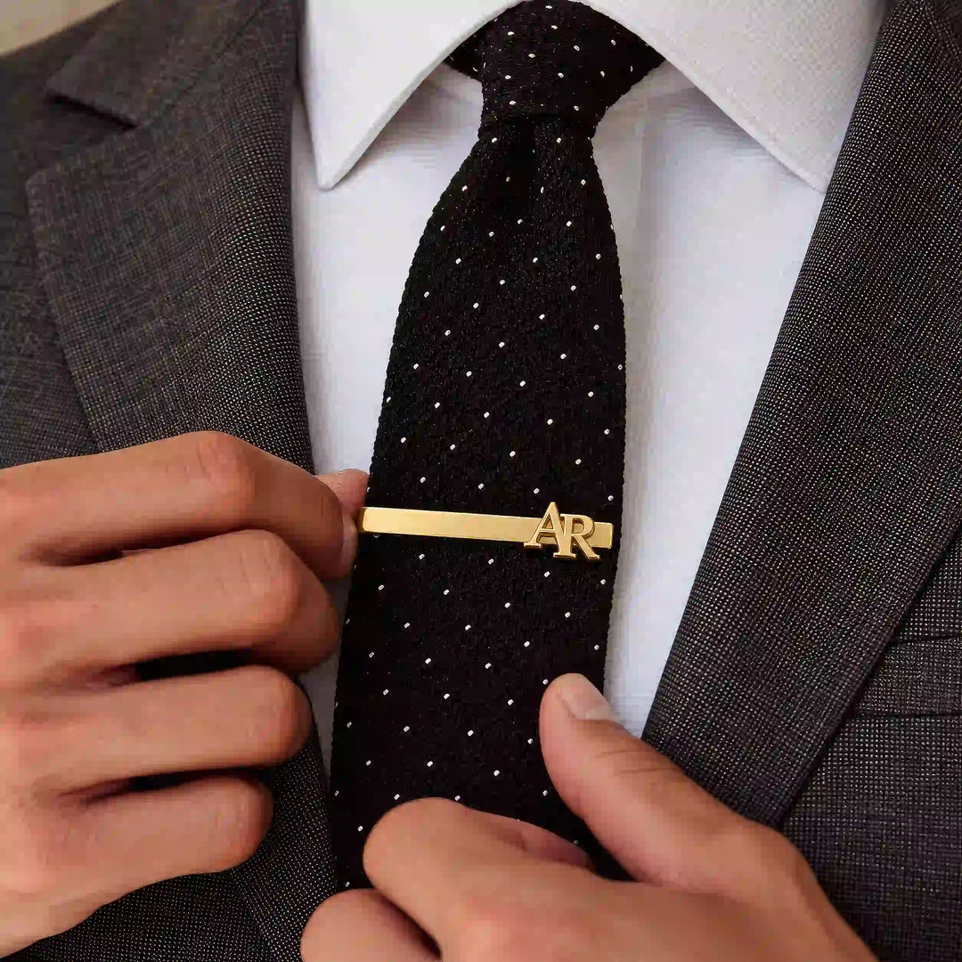 Personalised gold tone two initial monogram tie pin — worn on a tie