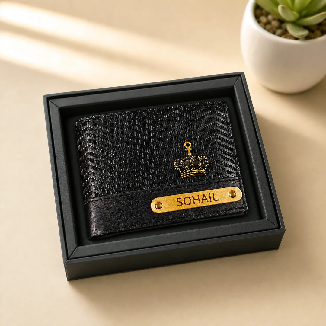 Black textured wallet with gold accents and &