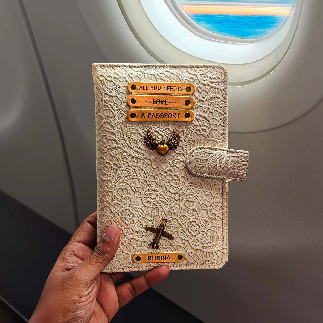 Decorative travel holder with lace design and motivational quote held in front of an airplane window - TPC Gifts 