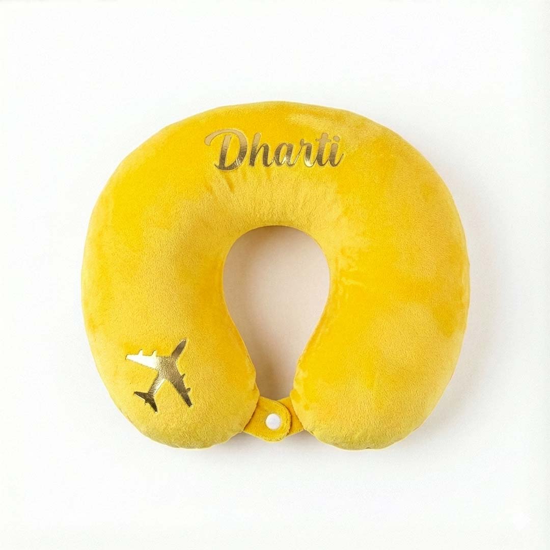 Yellow travel neck pillow with &