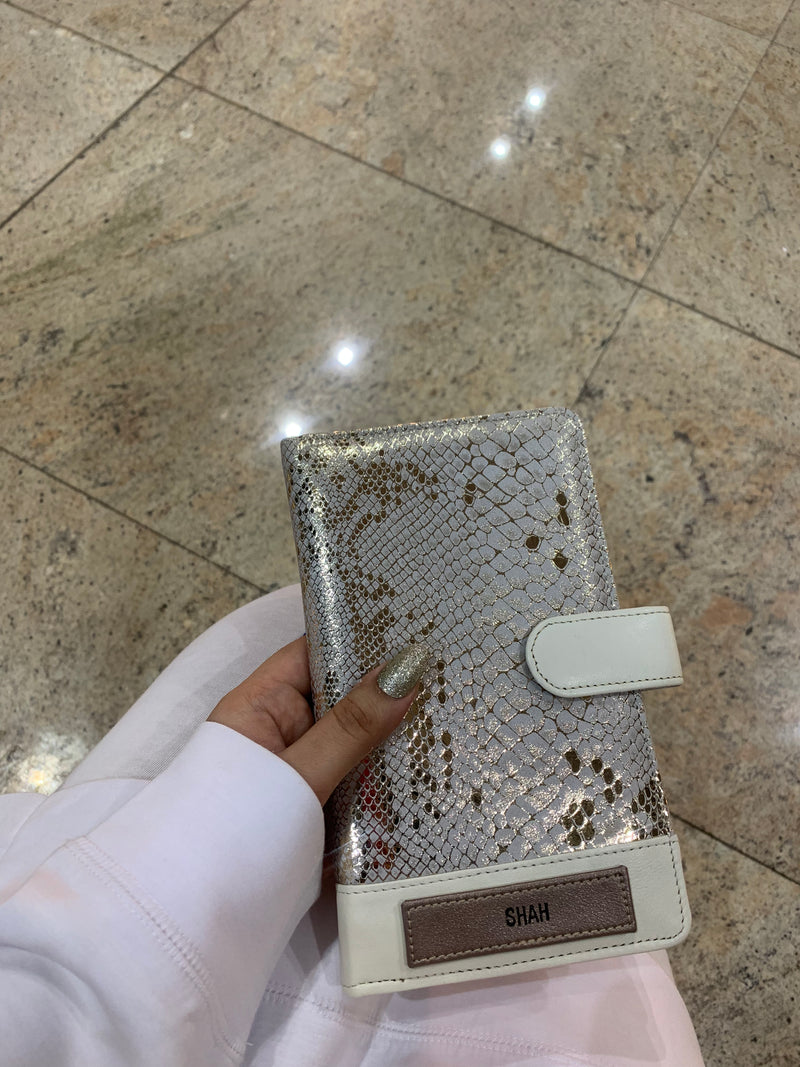 Golden Print Personalised Leather Travel Wallet in the airport
