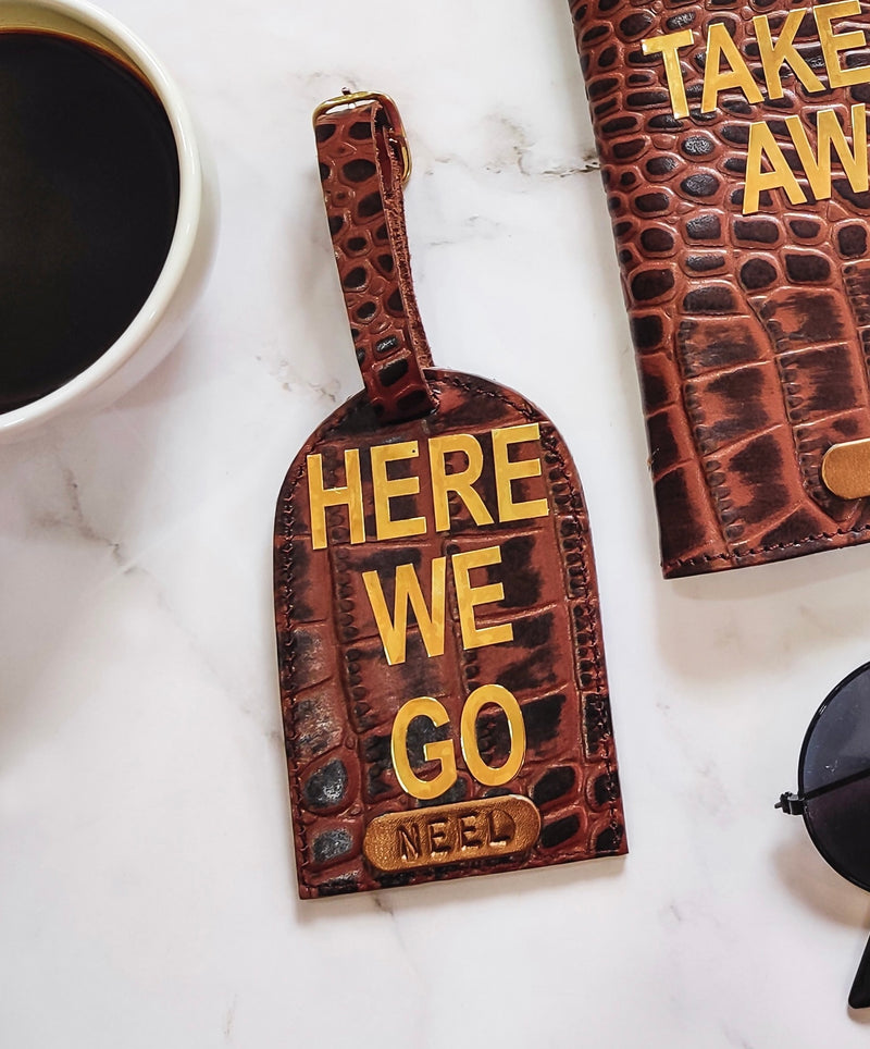 Genuine Leather Luggage Tag by tPC Gifts. brown Croco texture design with Here we go sticker on the tag. Leather passport cover at the side as well