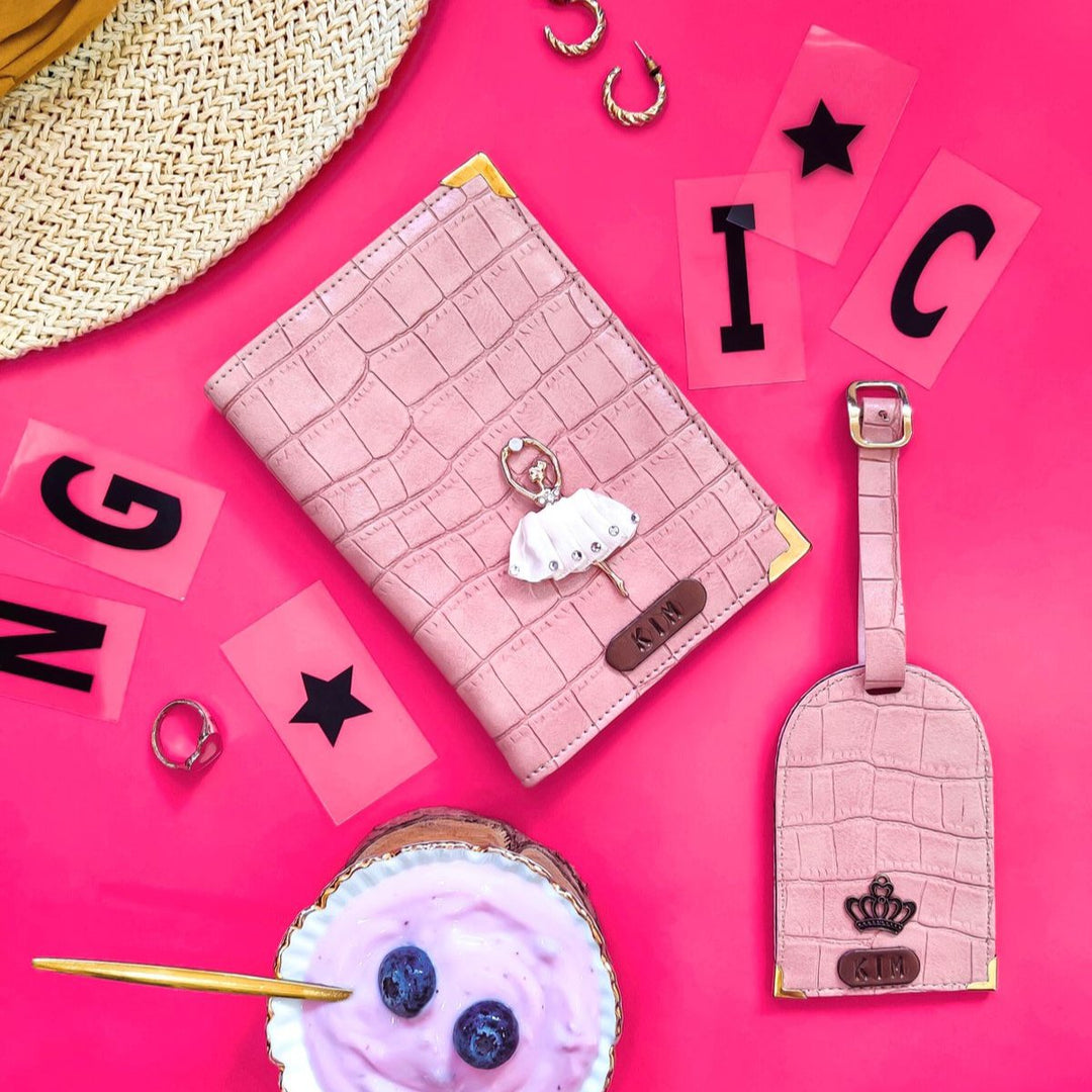 A set of pink kids passport cover and luggage tag with personalized text &