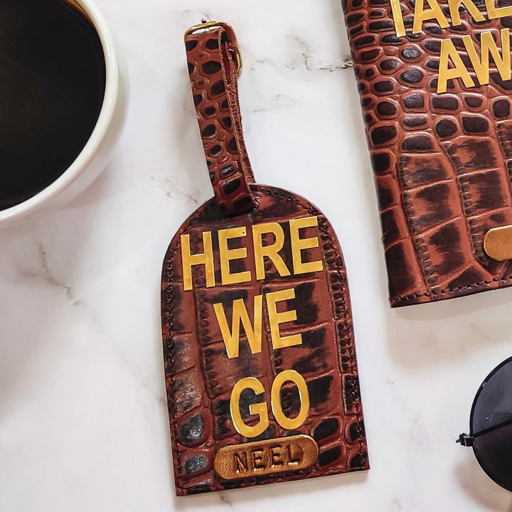 Genuine Leather Luggage Tag by tPC Gifts. brown Croco texture design with Here we go sticker on the tag. Leather passport cover at the side as well